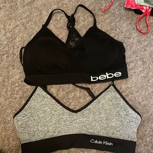 2 pack bralettes. One all black Bebe and one black and grey Calvin Klein
